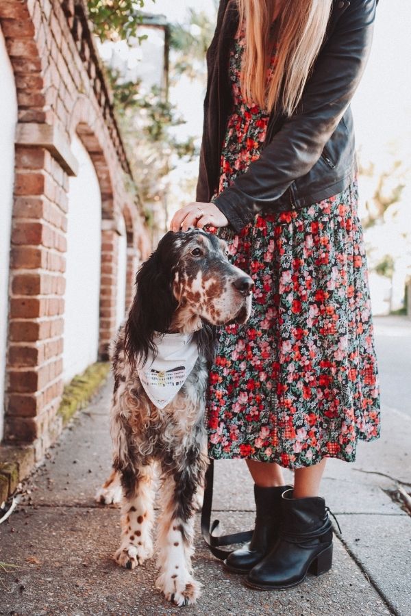 dog and girl in flower skirt